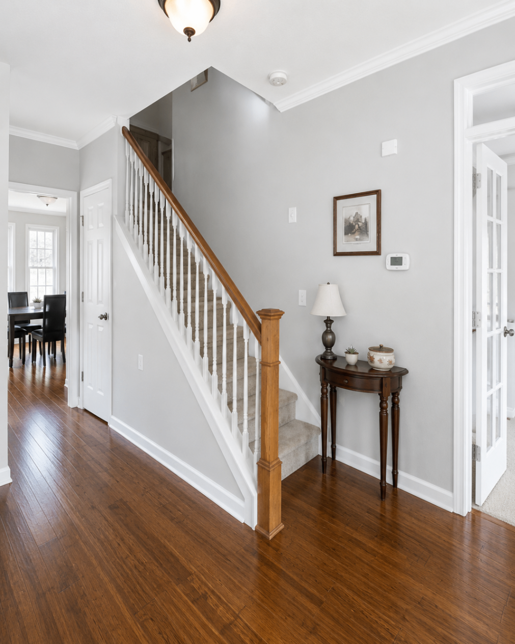 Warm Tan to Modern Gray Foyer β after