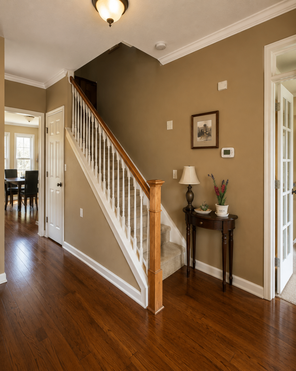 Warm Tan to Modern Gray Foyer β before